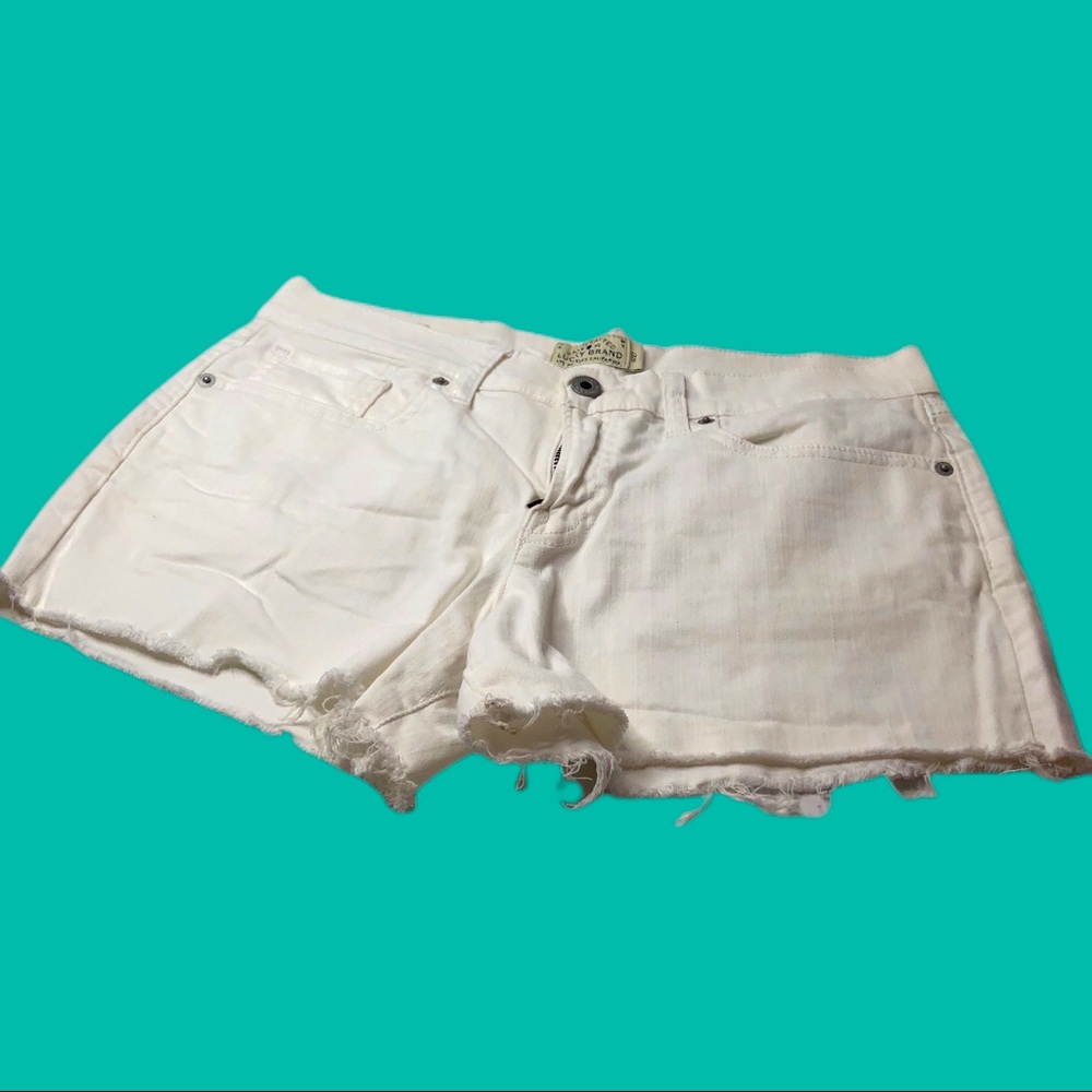 Size 24/4 Lucky Brand cut off white jean shorts.